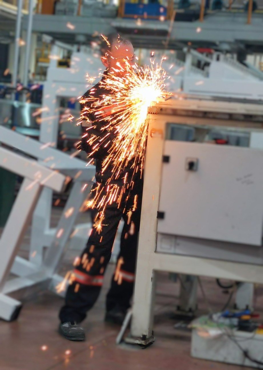 Mechanical modification work being carried out on industrial equipment