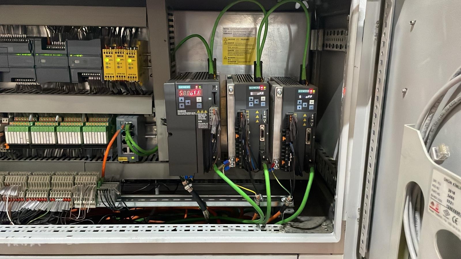 Drive section and motion-control components inside the control cabinet