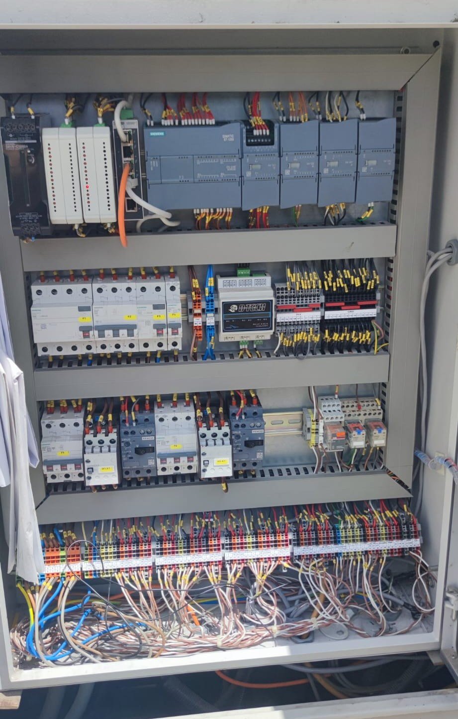 Electrical control cabinet from another retrofit application