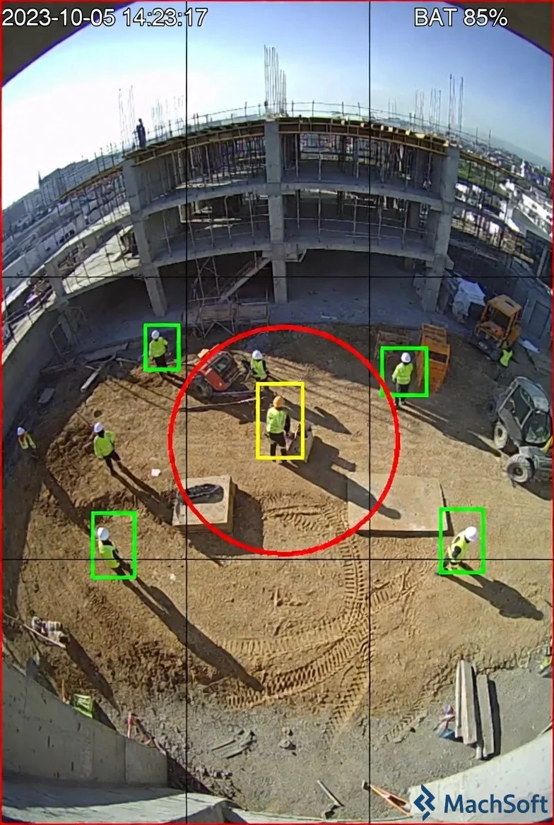 Camera view of a construction site with PPE detection markers
