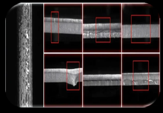 Surface and part inspection image with red detection regions over a metal profile